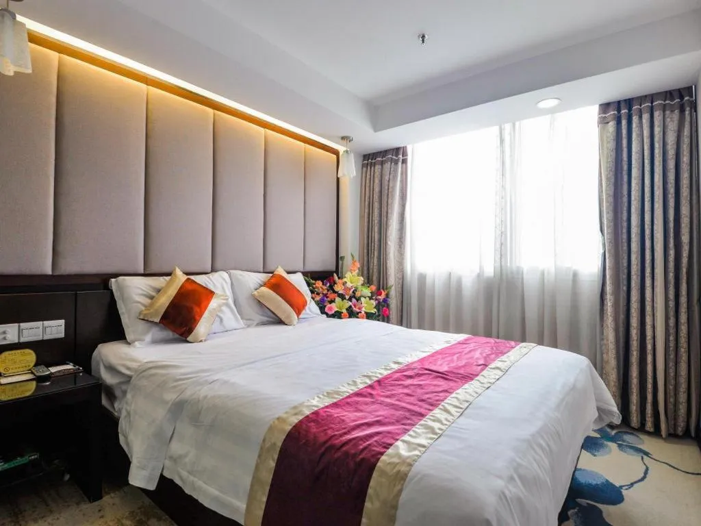 Bed in New World Hotel