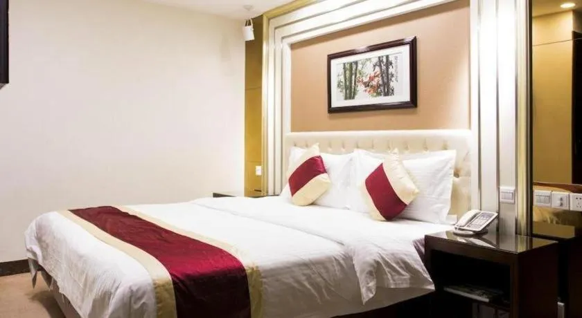 Bed in New World Hotel