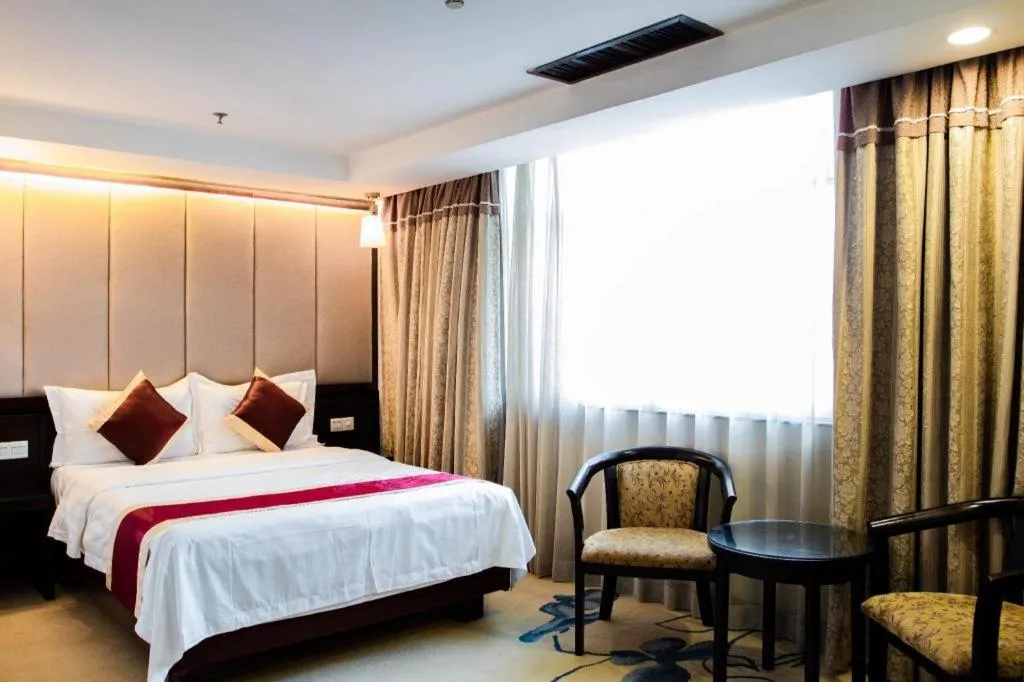 Bed in New World Hotel