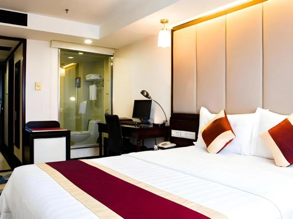 Bed in New World Hotel