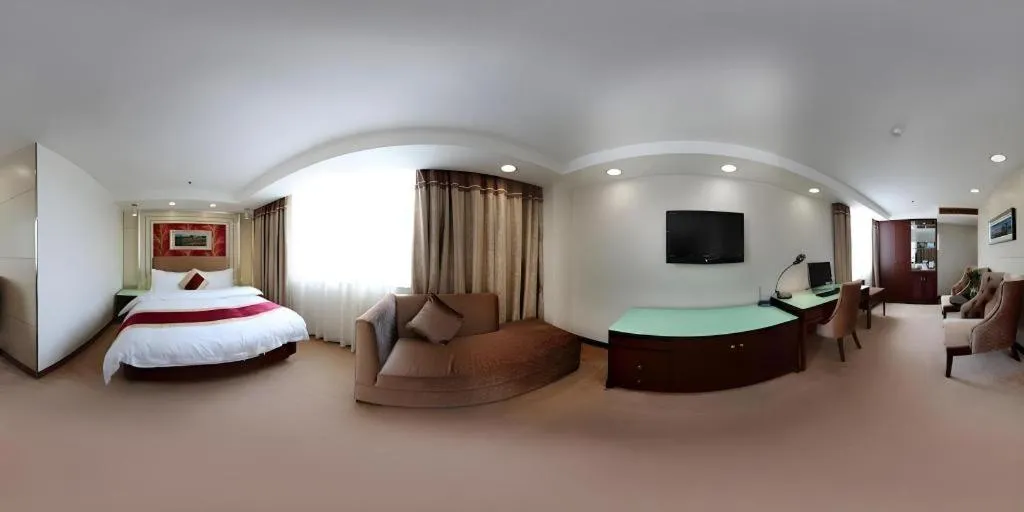 Bed in New World Hotel