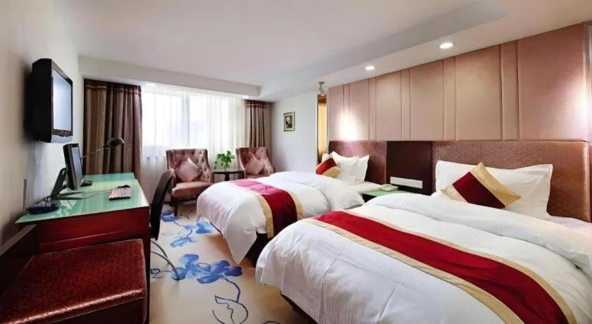 Bed in New World Hotel