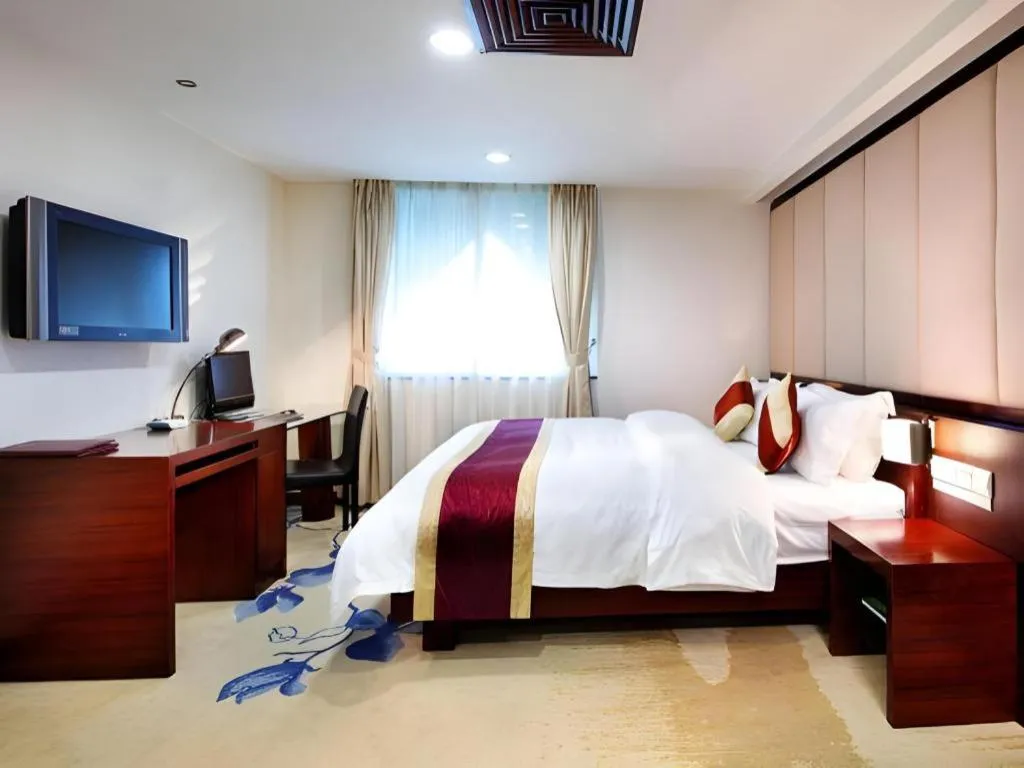 Bed in New World Hotel