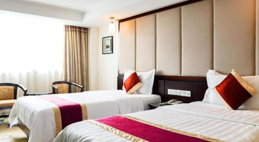 Bed in New World Hotel