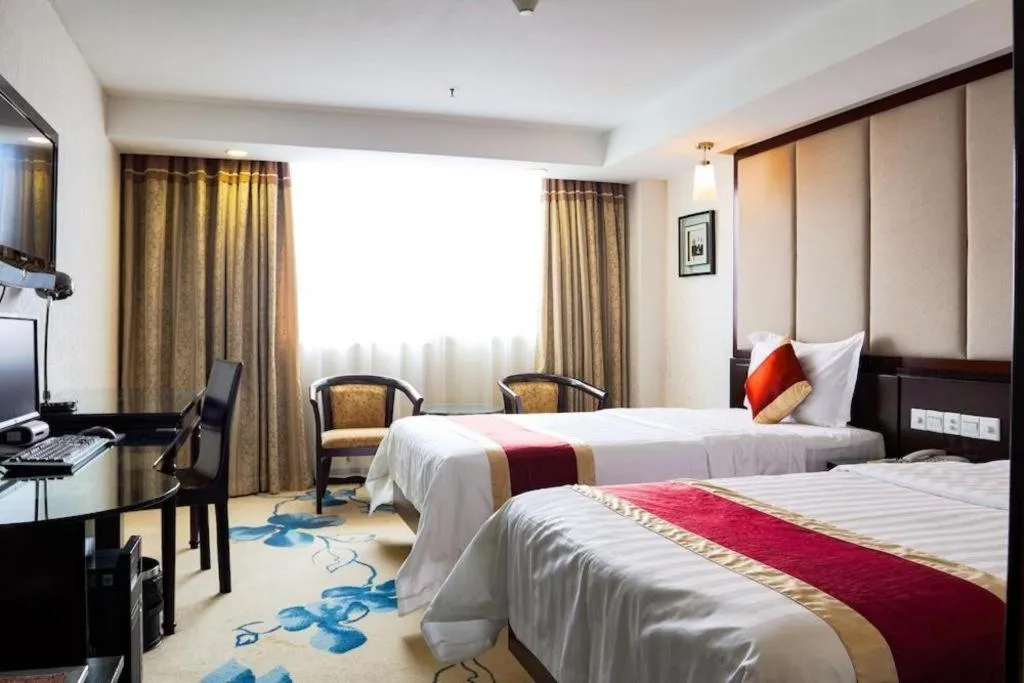 Bed in New World Hotel