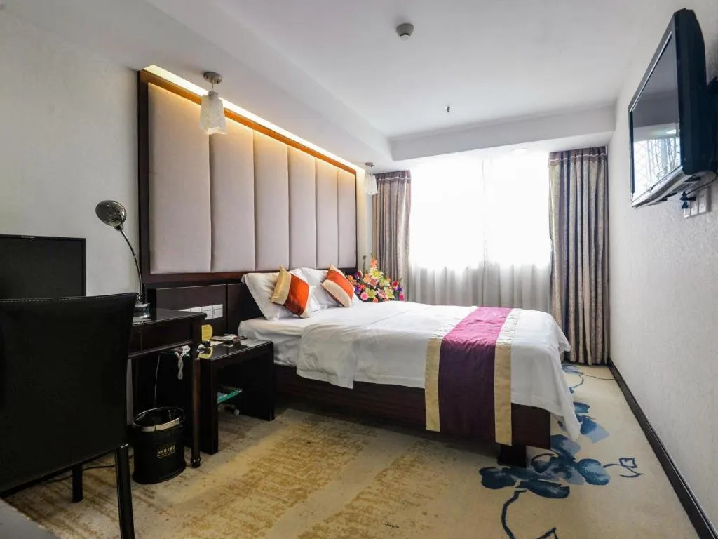 Bed in New World Hotel