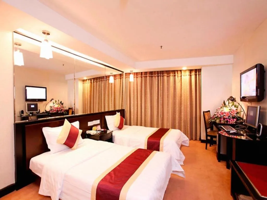 Bed in New World Hotel