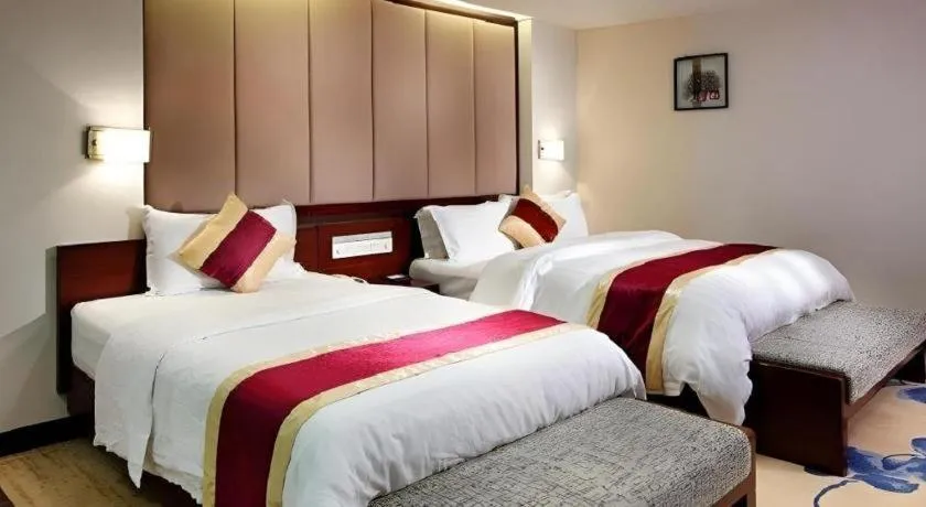 Bed in New World Hotel