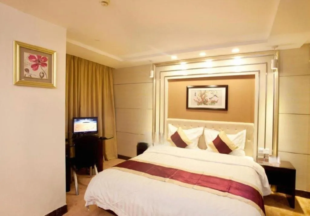 Bed in New World Hotel