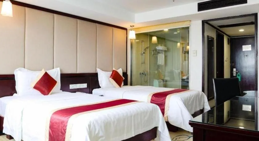 Bed in New World Hotel