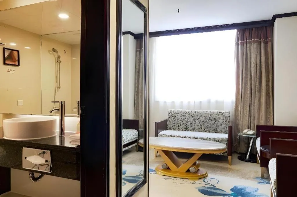 Bed in New World Hotel