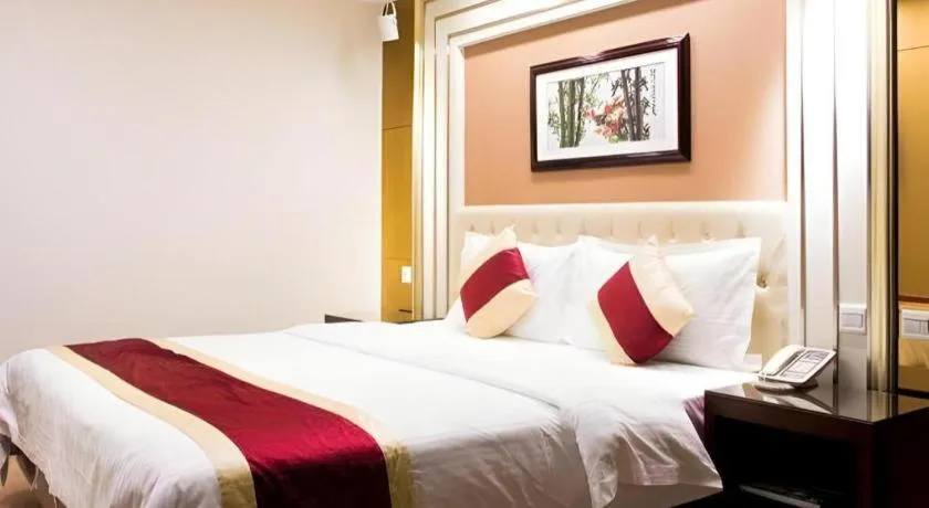 Bed in New World Hotel