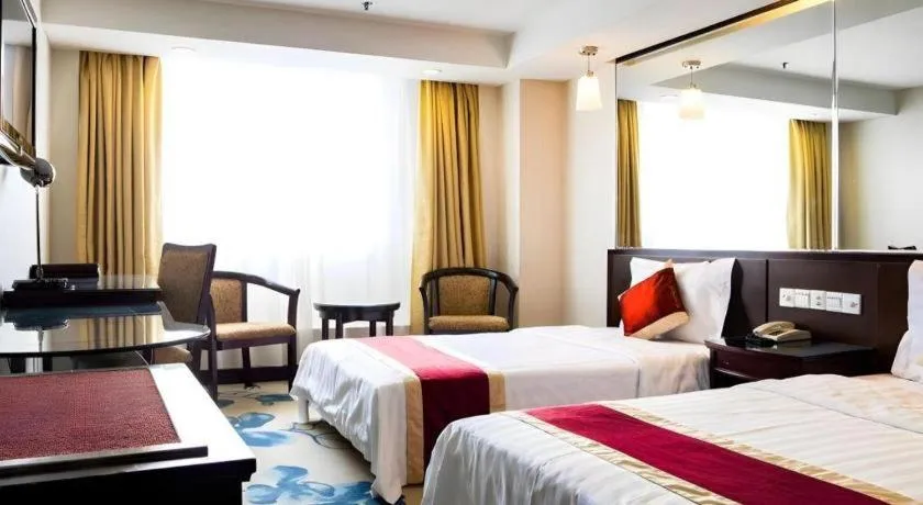 Bed in New World Hotel