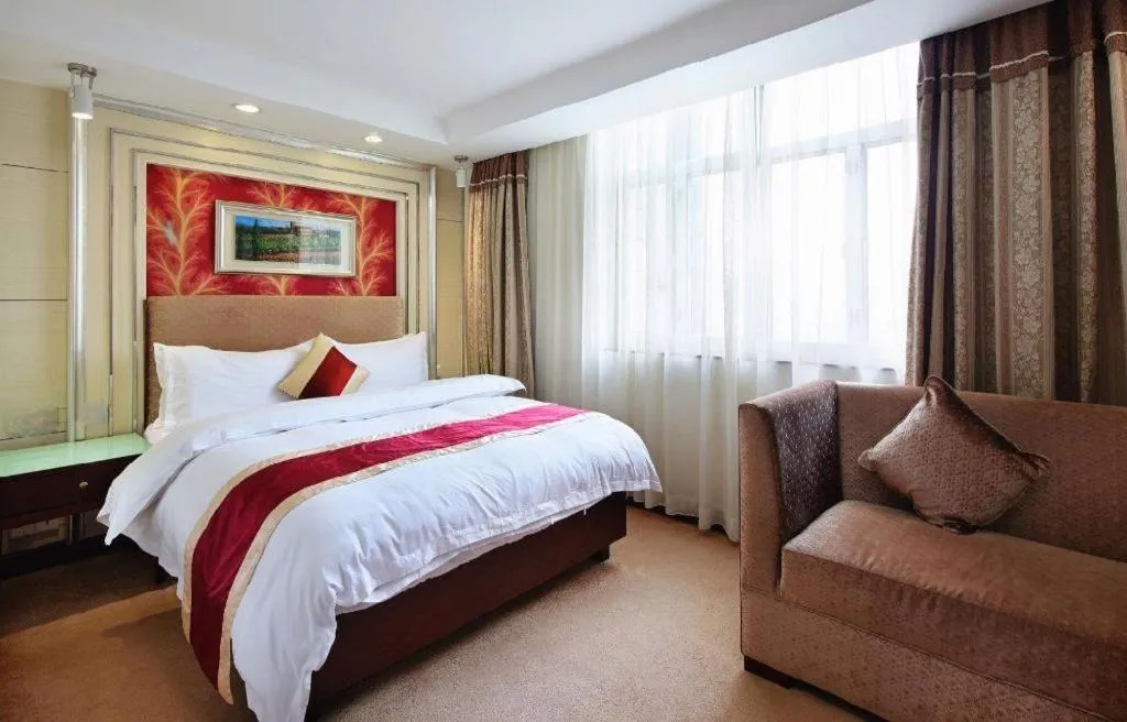 Bed in New World Hotel