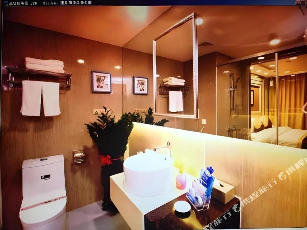 Bed in New World Hotel