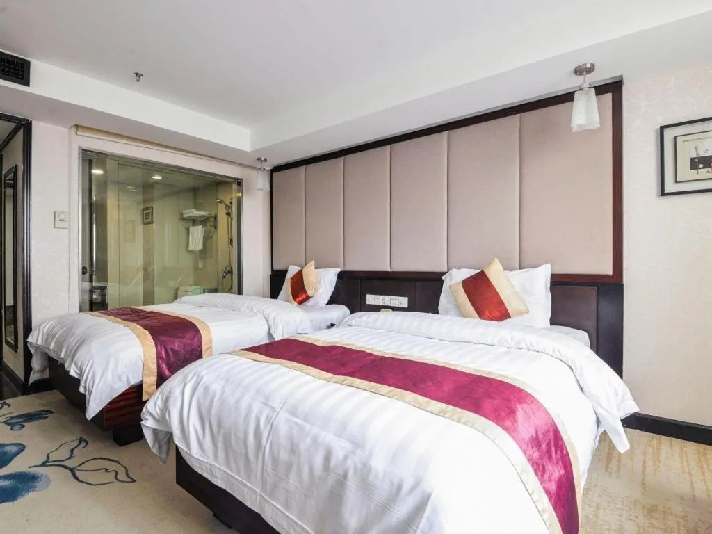 Bed in New World Hotel