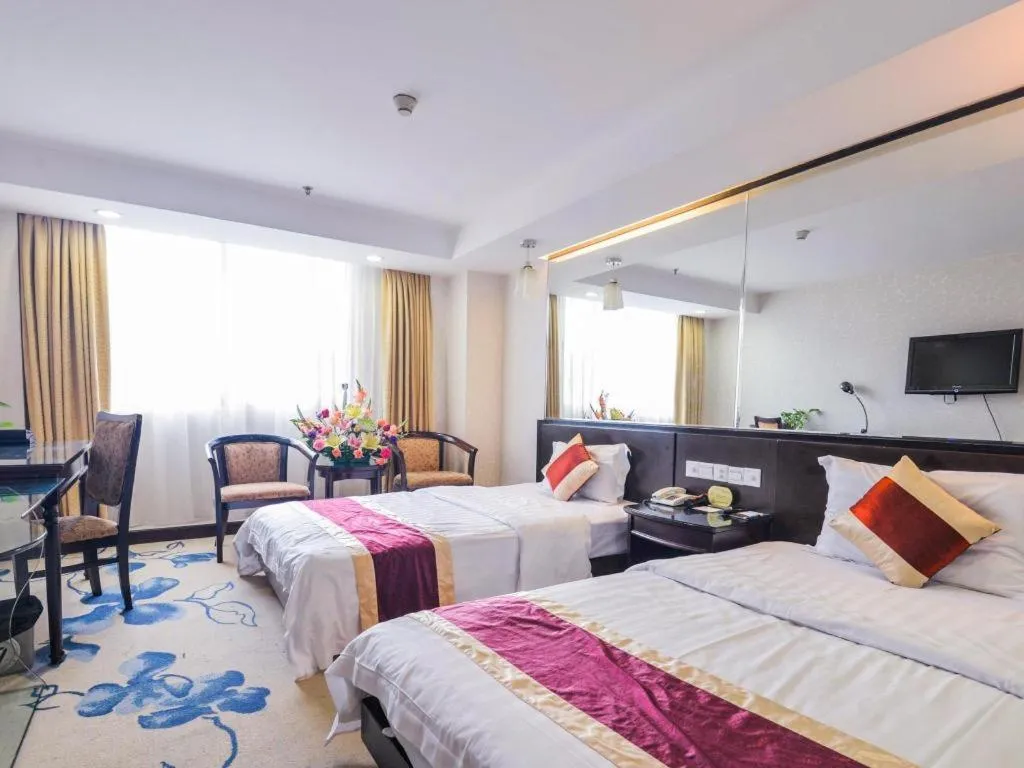 Bed in New World Hotel