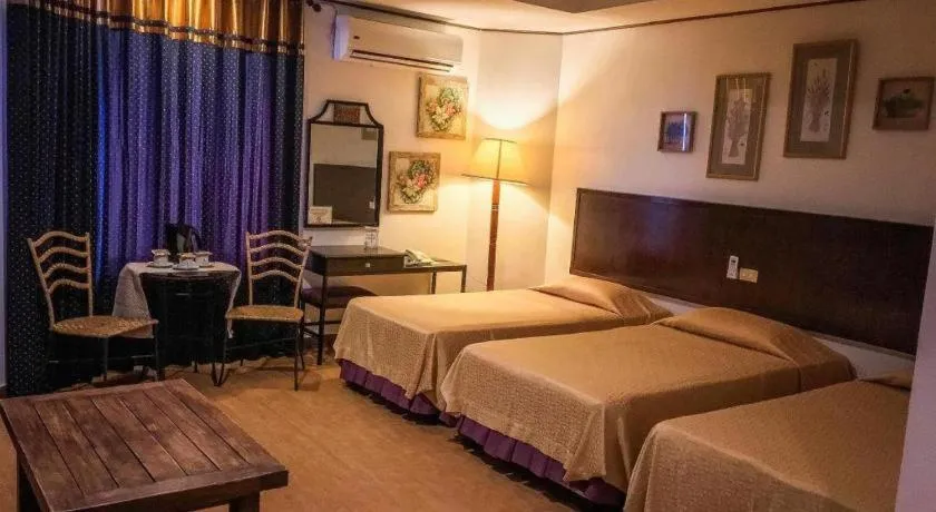 Bed in Subic Park Hotel