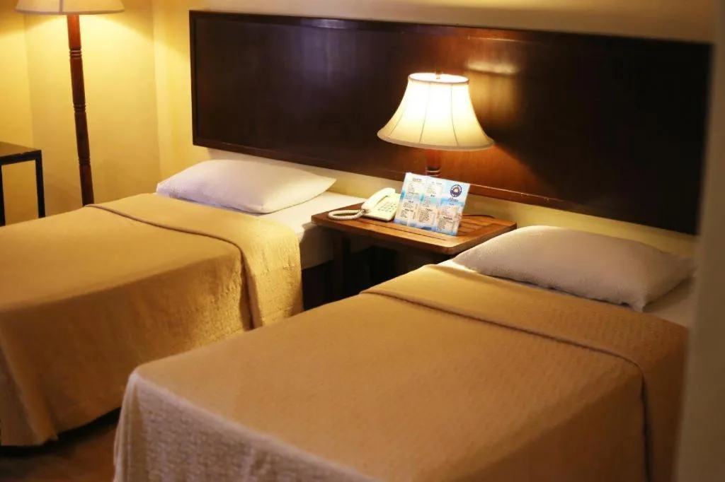 Bed in Subic Park Hotel