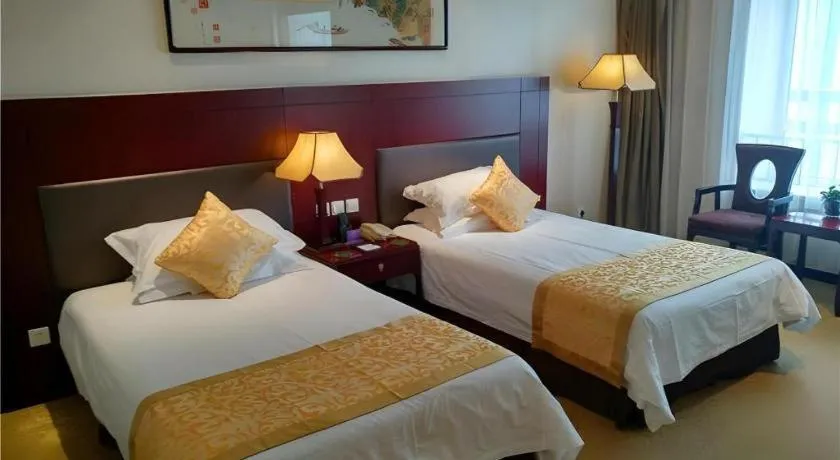 Bed in Zhong Yi Peng Ao Hotel