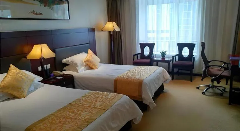 Bed in Zhong Yi Peng Ao Hotel