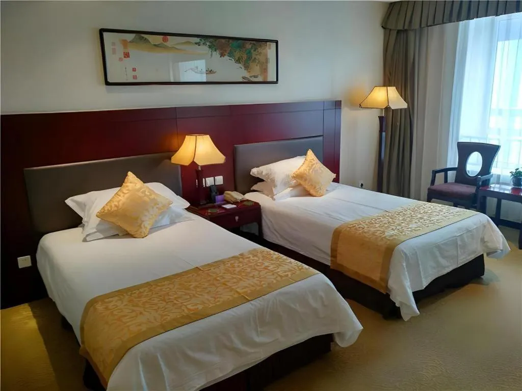 Bed in Zhong Yi Peng Ao Hotel