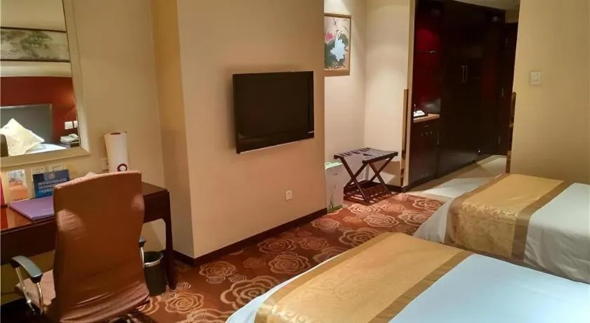 Bed in Zhong Yi Peng Ao Hotel