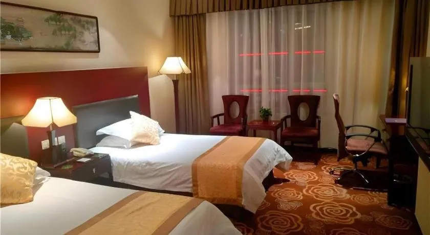 Bed in Zhong Yi Peng Ao Hotel