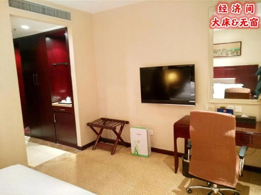 Bed in Zhong Yi Peng Ao Hotel