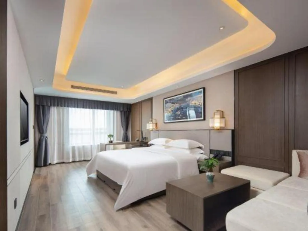 Bed in Zhong Yi Peng Ao Hotel