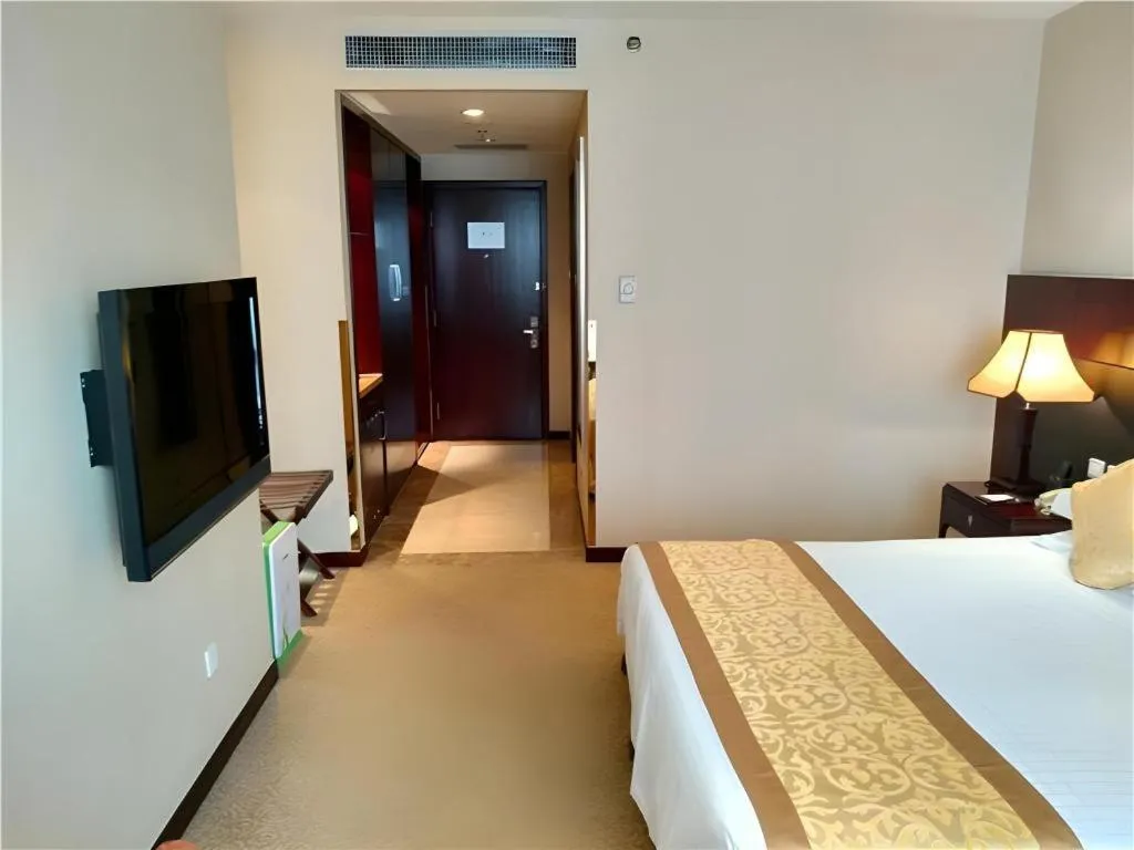 Bed in Zhong Yi Peng Ao Hotel