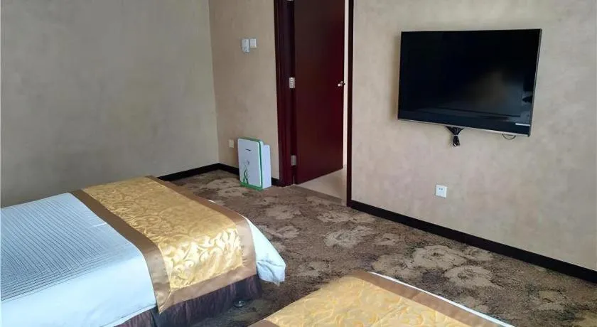 Bed in Zhong Yi Peng Ao Hotel