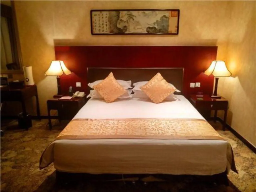 Bed in Zhong Yi Peng Ao Hotel