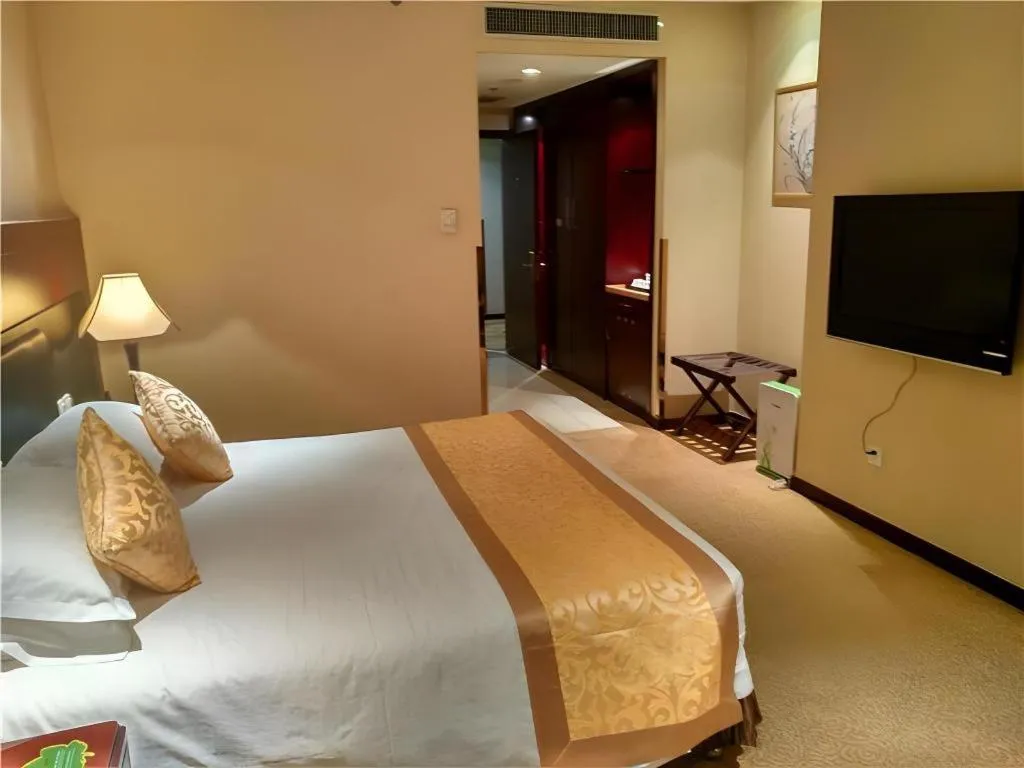 Bed in Zhong Yi Peng Ao Hotel