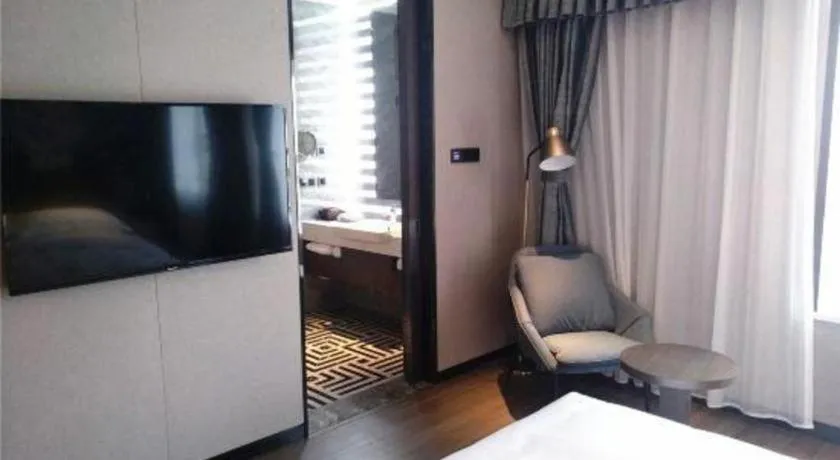 Bed in Zhong Yi Peng Ao Hotel