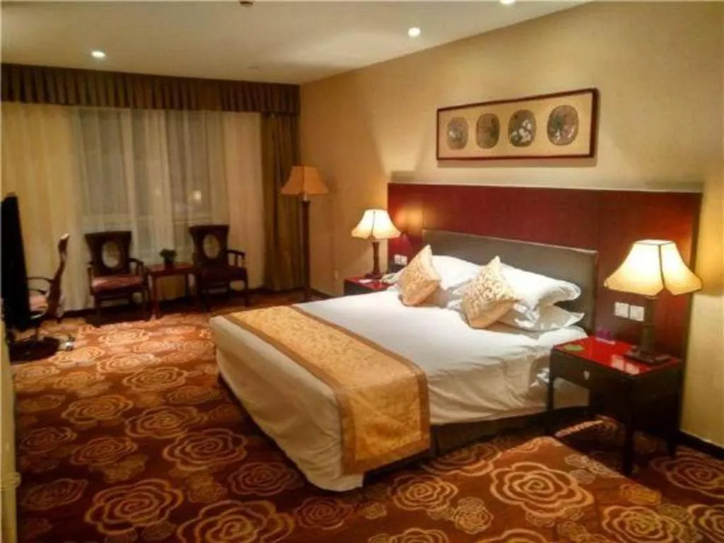 Bed in Zhong Yi Peng Ao Hotel