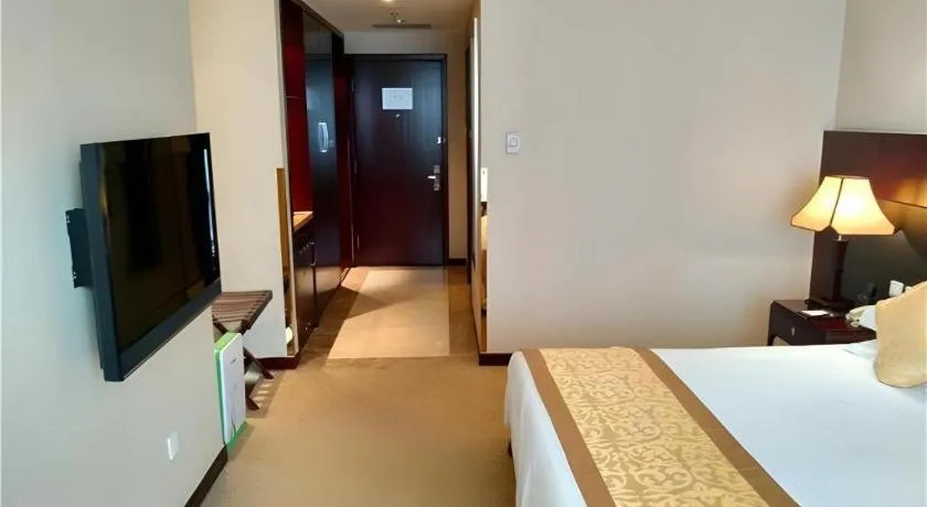 Bed in Zhong Yi Peng Ao Hotel