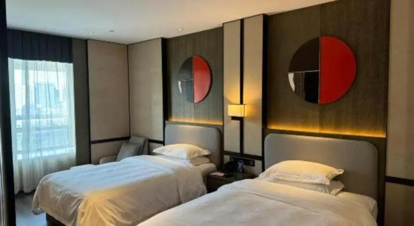 Bed in Zhong Yi Peng Ao Hotel