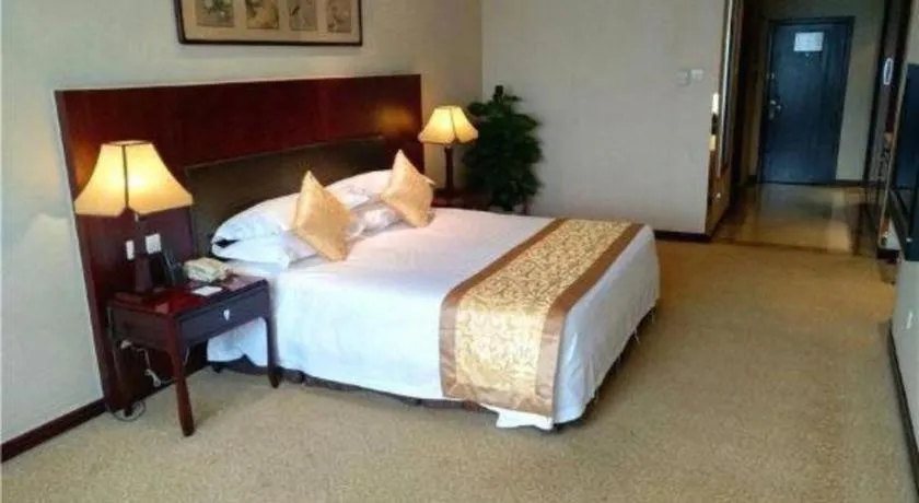Bed in Zhong Yi Peng Ao Hotel