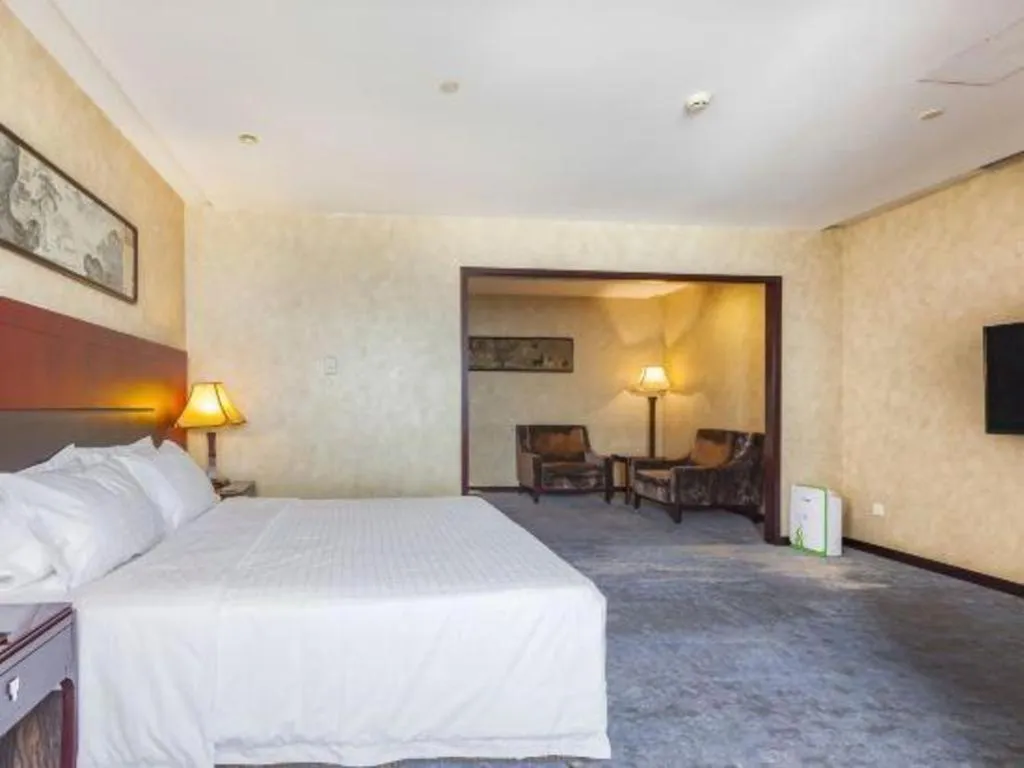 Bed in Zhong Yi Peng Ao Hotel