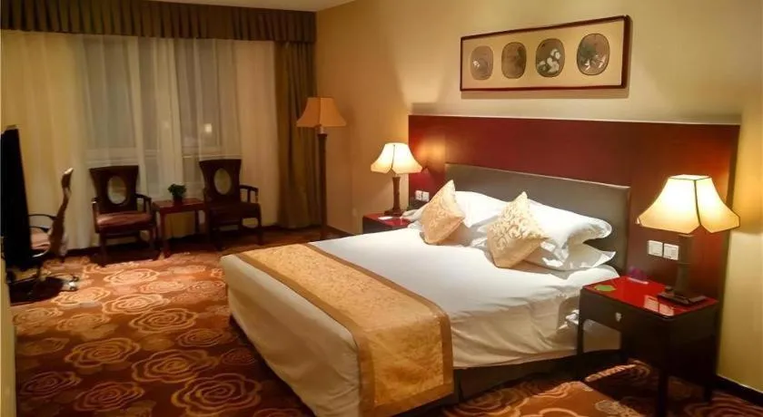 Bed in Zhong Yi Peng Ao Hotel