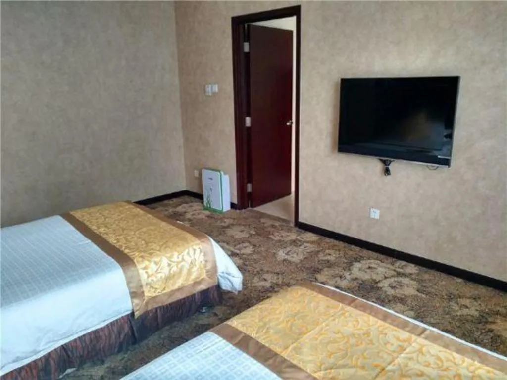 Bed in Zhong Yi Peng Ao Hotel