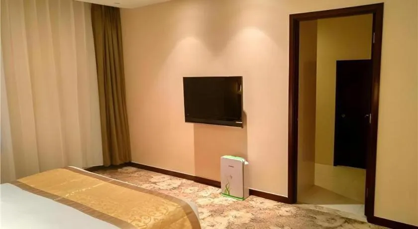 Bed in Zhong Yi Peng Ao Hotel