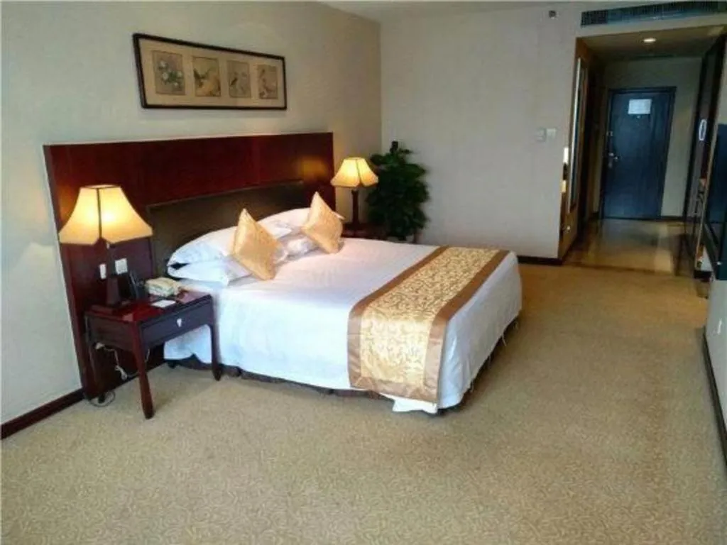 Bed in Zhong Yi Peng Ao Hotel