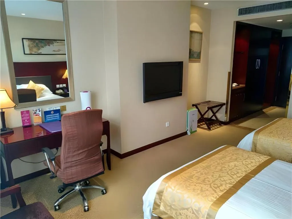 Bed in Zhong Yi Peng Ao Hotel