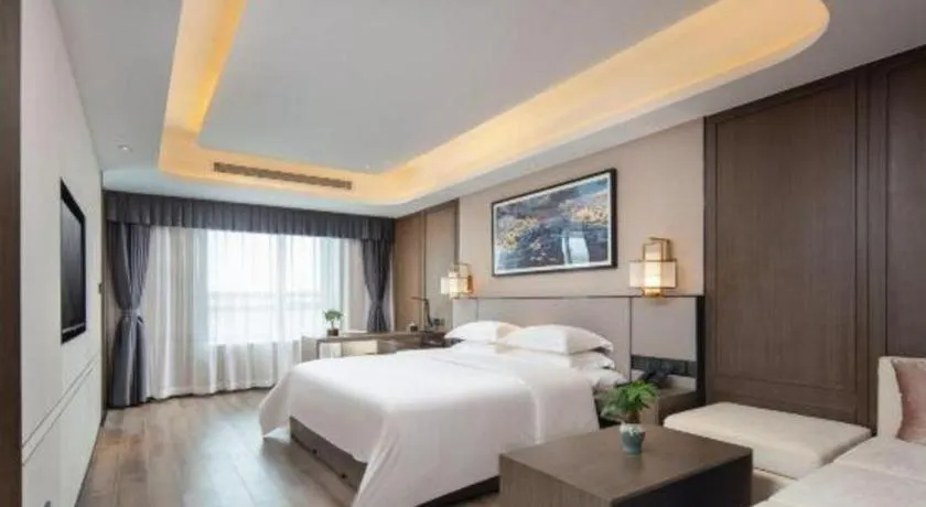 Bed in Zhong Yi Peng Ao Hotel