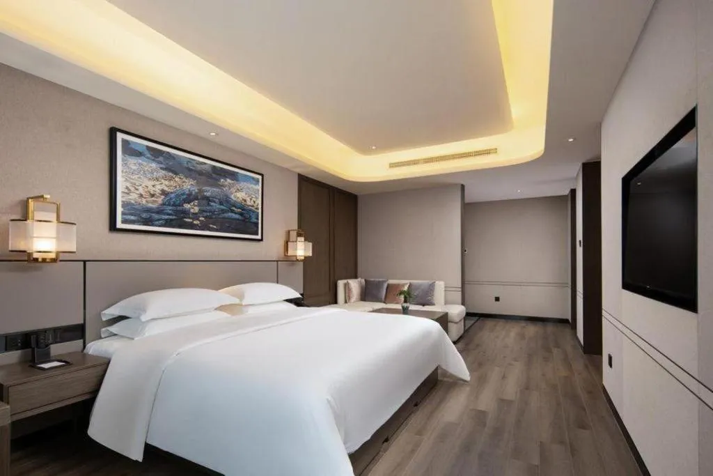 Bed in Zhong Yi Peng Ao Hotel