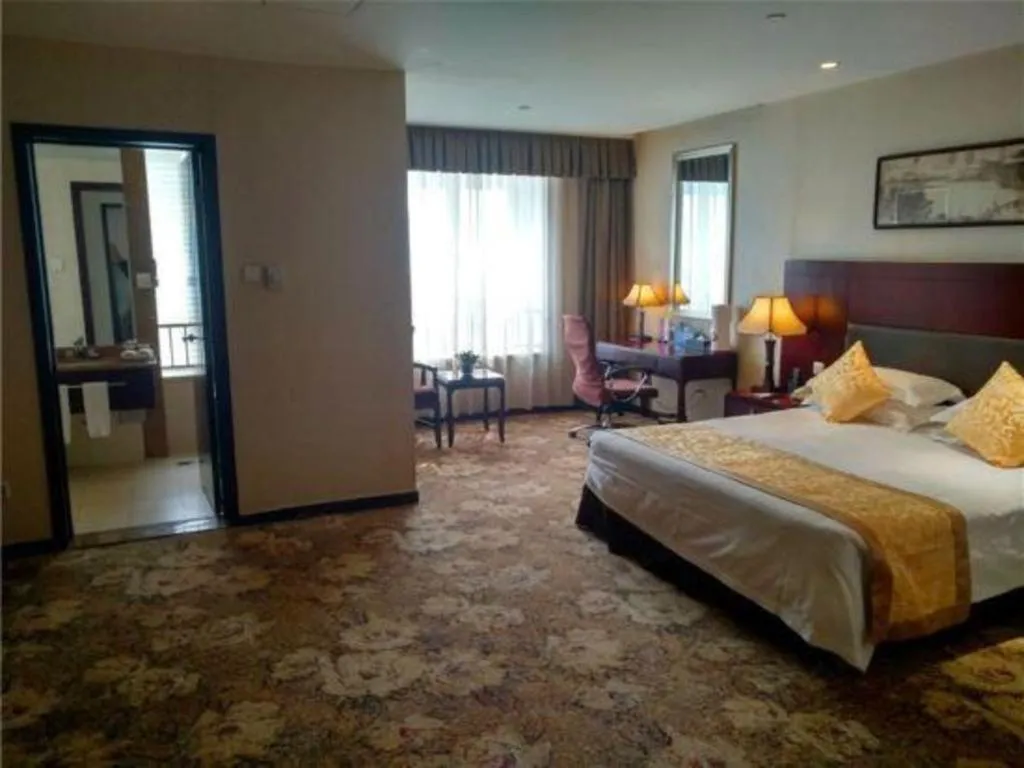 Bed in Zhong Yi Peng Ao Hotel