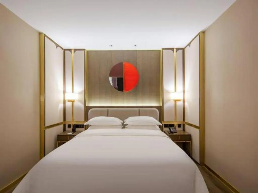 Bed in Zhong Yi Peng Ao Hotel