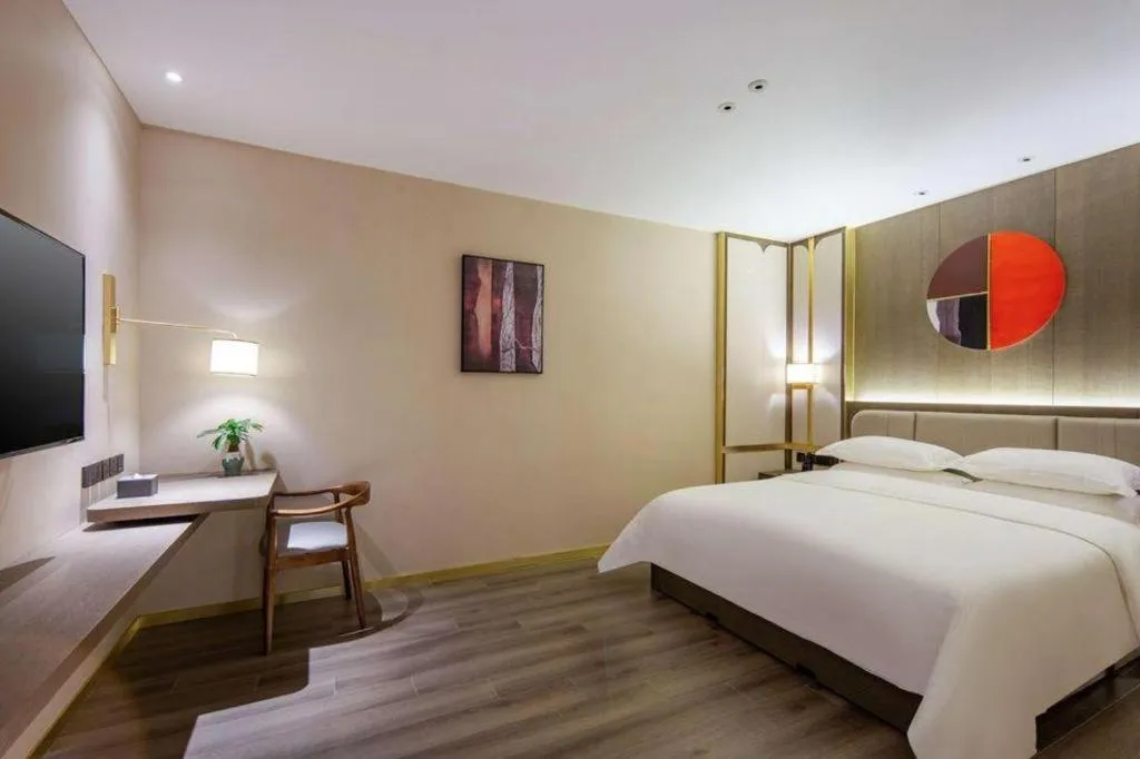 Bed in Zhong Yi Peng Ao Hotel